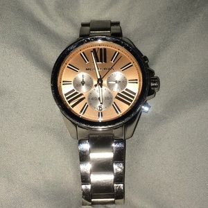 Silver Michael Kors watch with peach backing